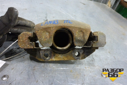 Суппорт передний левый (96226977) для Chevrolet Lanos с 2004г (Ланос)