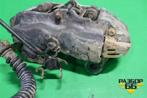 Суппорт задний левый (4х поршневой) (7L6615425) для Volkswagen Touareg c 2002-2010г (Туарег)